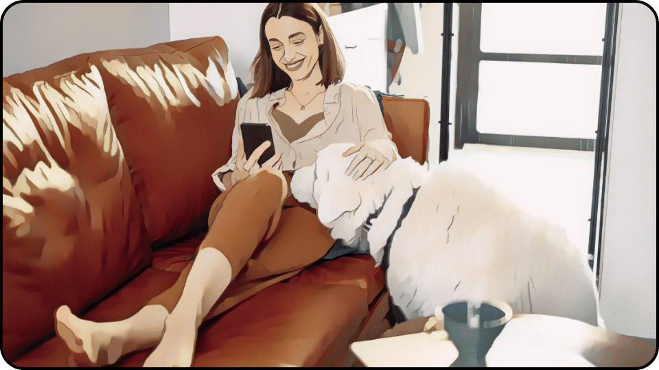 How to Get Dog Pee Out of Couch A happy woman sits on a cozy couch cuddling with her dog creating a warm and inviting atmosphere